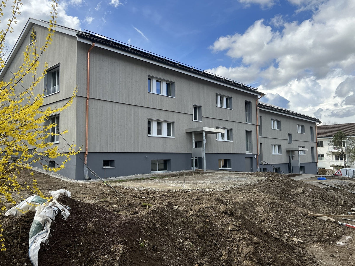 Wohnhäuser mit neuer Holzfassade in Zürich-Albisrieden